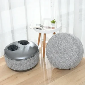 Zoom sur le pouf massant CAIRN de couleur gris de la marque Bodyskin dans un environnement lumineux